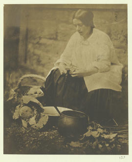 (Woman peeling vegetables)