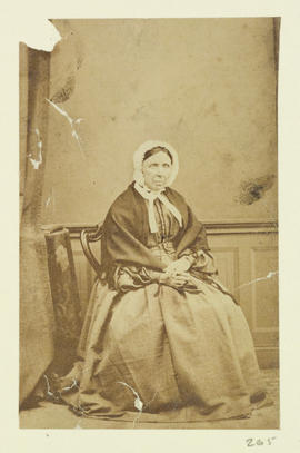 (Elderly woman, seated)