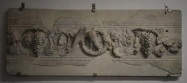 Plaster cast of section of architrave with vines and eagle in clipeus (Version 3)