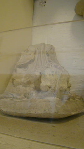 Plaster cast of base of column cluster with human mask (Version 1)