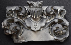 Plaster cast of top part of heraldic shield, with helm, crest and mantling (Version 2)