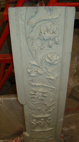 Plaster cast of section of pilaster with vase, foliage and putti (Version 1)