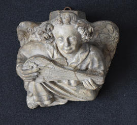 Plaster cast of corbel of angel playing lute (Version 2)