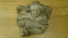 Plaster cast of corbel of angel playing lute (Version 1)