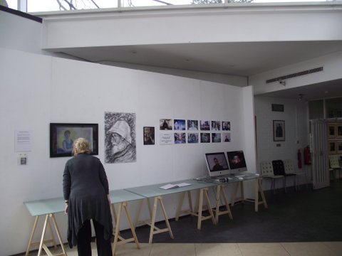 An exhibition by five UCA students. The images in the far right and on the screen are still shots from the Maidstone Oral History Project, put up by Fine Art student Joanna Robinson, recording memories of ex staff and students from the Maidstone College of Art.