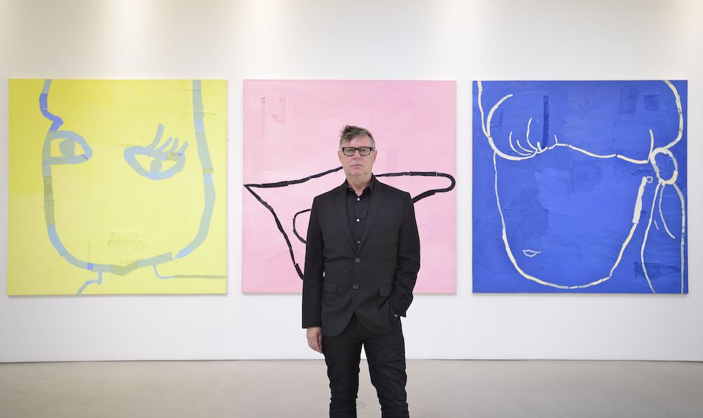 Fraser Taylor with his exhibition "Bodies of Work" at House for an Art Lover in 2015. Image courtesy of House for an Art Lover.