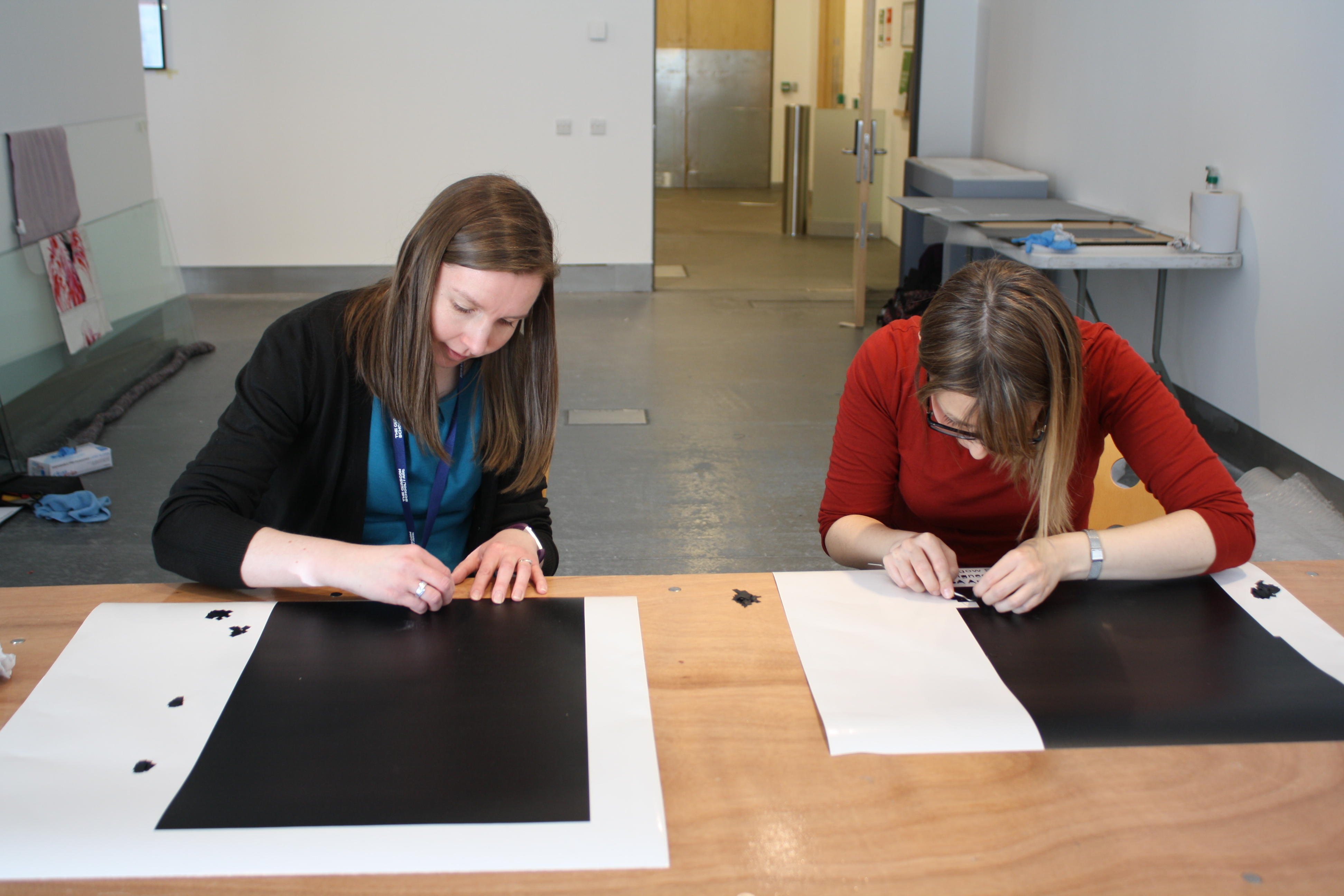 Skills for the Future trainee Jennifer Lightbody and Archives and Collections Manager Susannah Waters try their hand at vinyl weeding!
