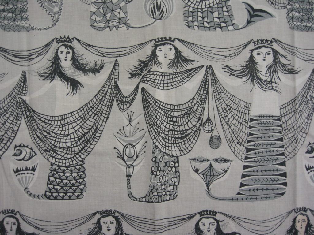 Mermaids textile design by Margaret Stewart is available to buy as a tea towel or a cushion from Centre for Advanced Textiles (Archive Reference: DC 075/9)