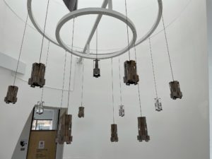 Cluster of restored Mackintosh Library Lights hanging in the Reid Building.