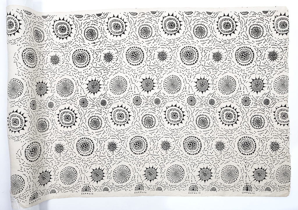 Image of black and white textile length with abstract natural design