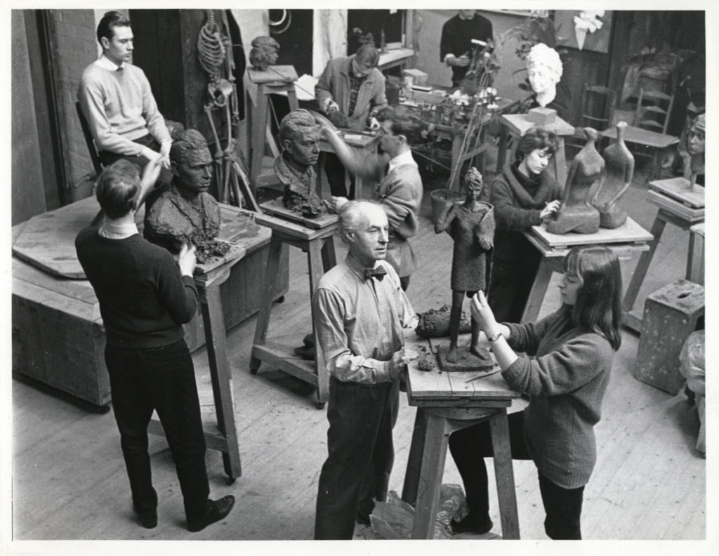 Black and White photograph of Benno Schotz teaching class